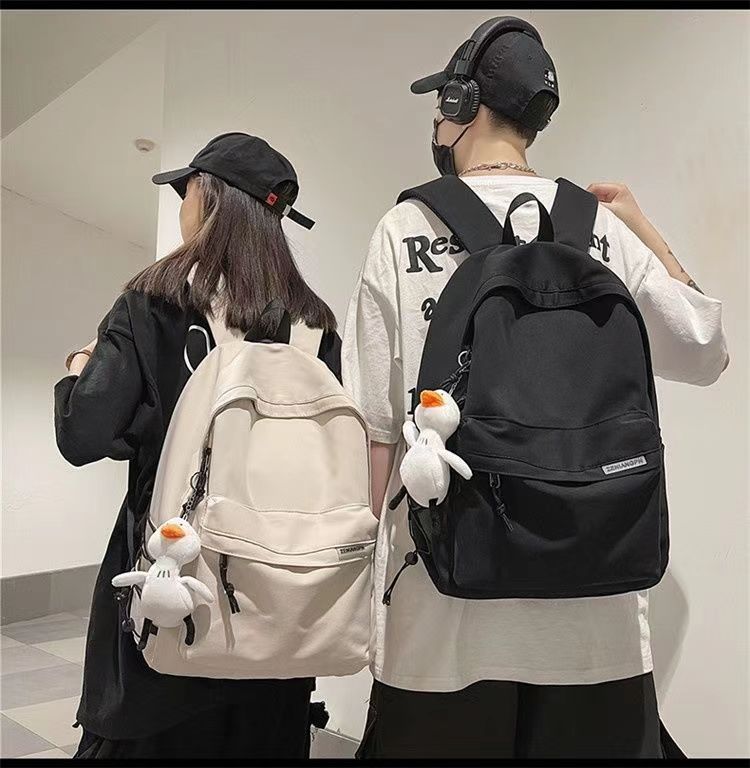 日系初高中学生上课书包男新款洋气质感纯色简约休闲女生双肩背包详情4