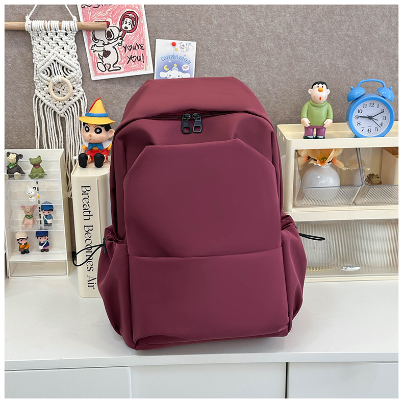 New large-capacity solid color backpacks for girls in foreign trade, simple and elegant school bags for junior and senior high school students pic 9
