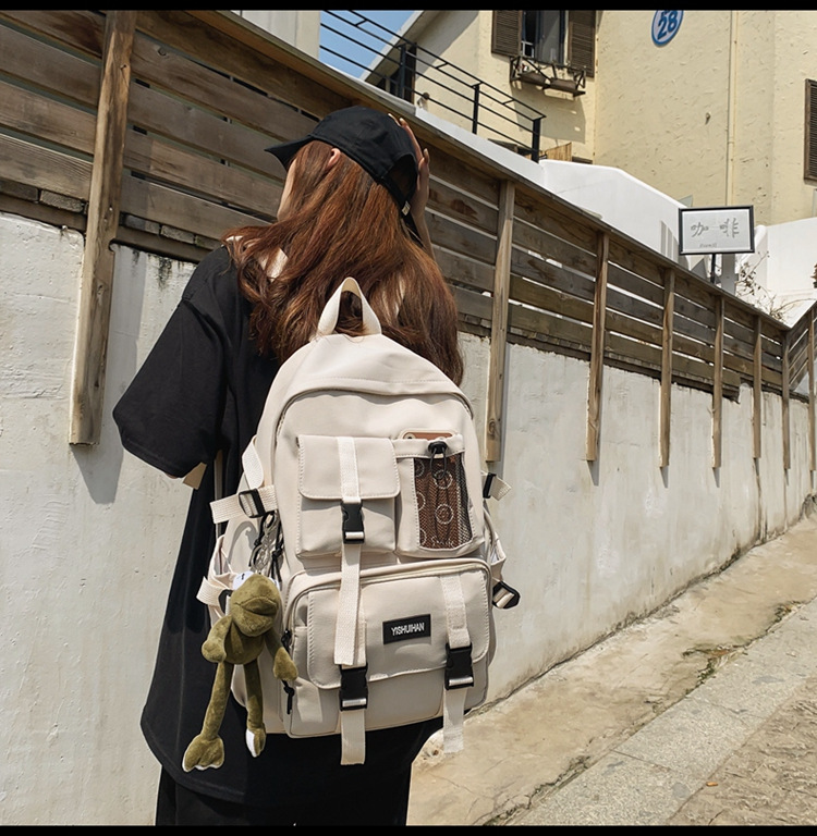 休闲百搭男女双肩包可爱挂件洋气潮流学生书包大容量工装风背包详情25