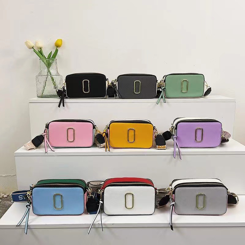 The 2024 new style of European and American simple, retro and fashionable camera bag for foreign trade features a trendy and niche design with a letter crossbody bag pic 1