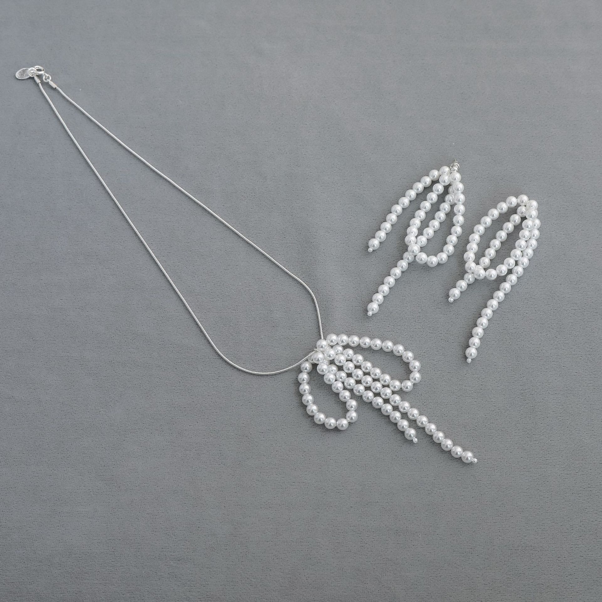 MOND韩版珍珠蝴蝶项链轻奢小众简洁法式流苏珍珠蝴蝶结耳钉锁骨链详情4