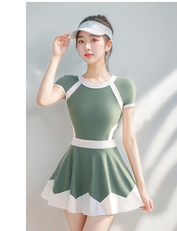 Green one-piece swimsuit models showcase long-sleeved, sexy backless sportswear for women. Summer sun protection fabric 107060 pic 9