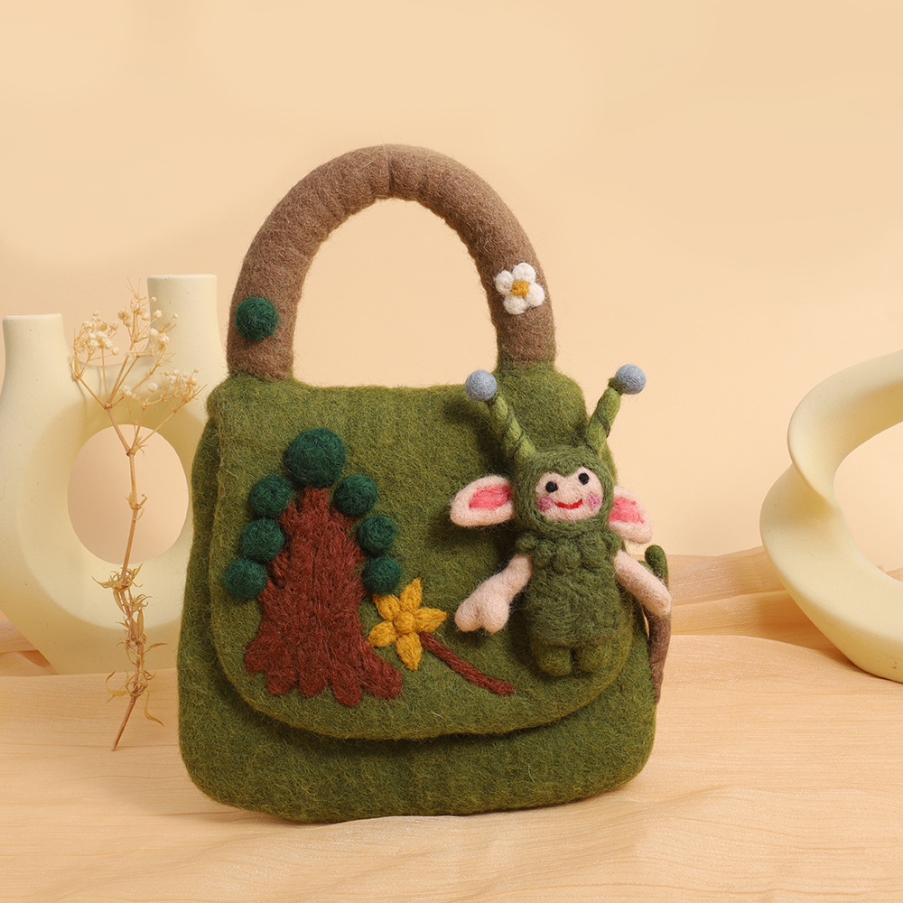 森系羊毛毡包包尼泊尔手工羊毛毡手拿包小众精致羊毛毡手提包批发详情6