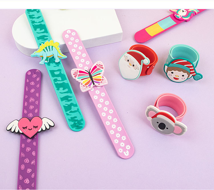 Dibujos animados de silicona pom ring niños clap pulsera lindo unicornio dinosaurio comercio exterior stock pulsera creativo pic 9