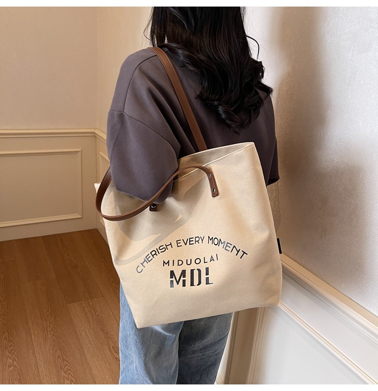 Large-capacity 2025 new style simple single-shoulder hand-carry cloth bag, college student class tote bag, versatile canvas bag for women pic 20
