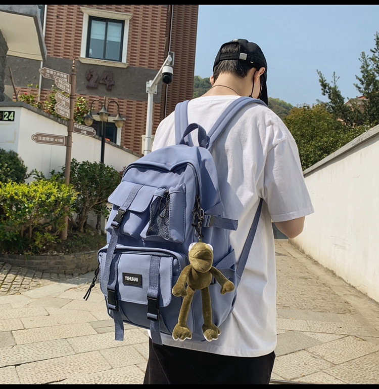 休闲百搭男女双肩包可爱挂件洋气潮流学生书包大容量工装风背包详情14