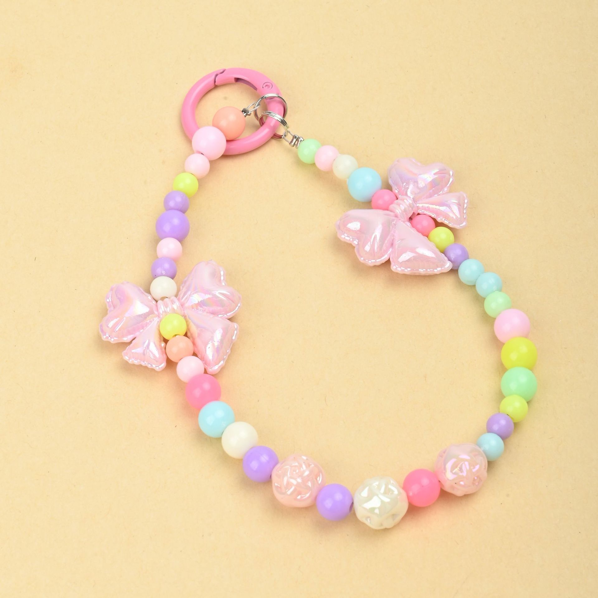 Wholesale of new colored candy-colored mobile phone chains, bows, beads, bag chains, water cup chains, car keychains and pendants pic 7