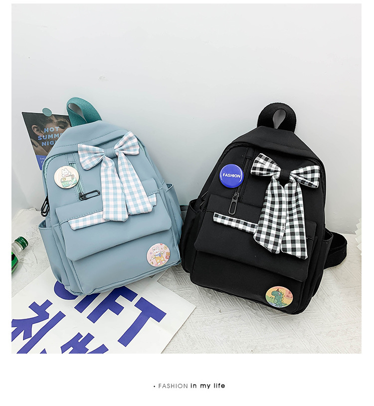 蝴蝶结书包女小学生大容量三到六年级初中轻便减负可爱简约双肩包详情11