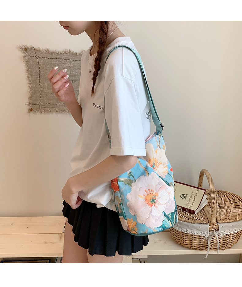 大容量国风印花水桶包女创意花卉个性手提单肩包设计感休闲斜挎包详情41