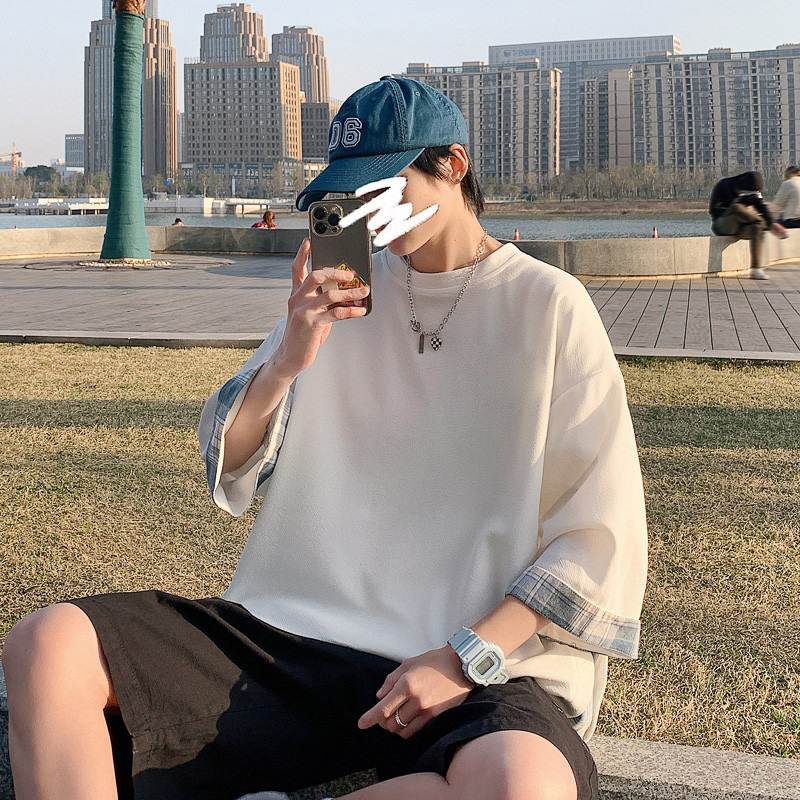 This is a new summer fashion Hong Kong brand ice silk T-shirt with a checkered patchwork design and a unique three-quarter sleeve style pic 3