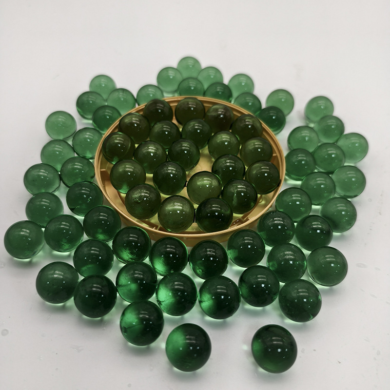 Deep green glass beads, scattered beads, pendants, small pieces, liu-shaped marbles, special sale, decorative landscape glass packaging materials, factory direct sales pic 1