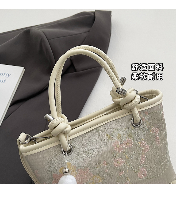 手拎新国潮式刺绣包包女2025春夏新款国风绣花时尚水桶包百搭斜挎包详情2