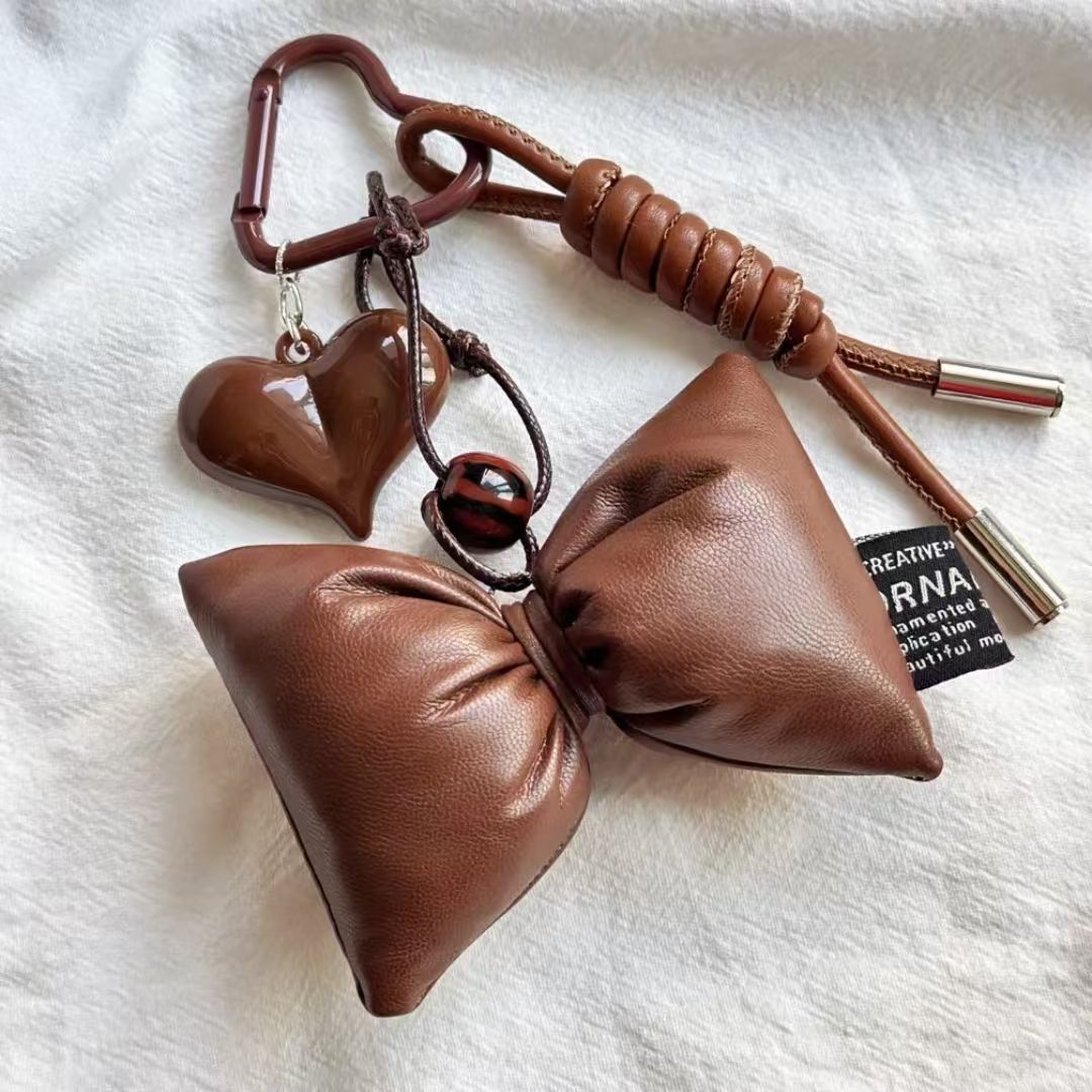 Original coffee-colored miu series bag pendant with a stylish and high-end leather texture, handcrafted autumn and winter brown bag pendant pic 4