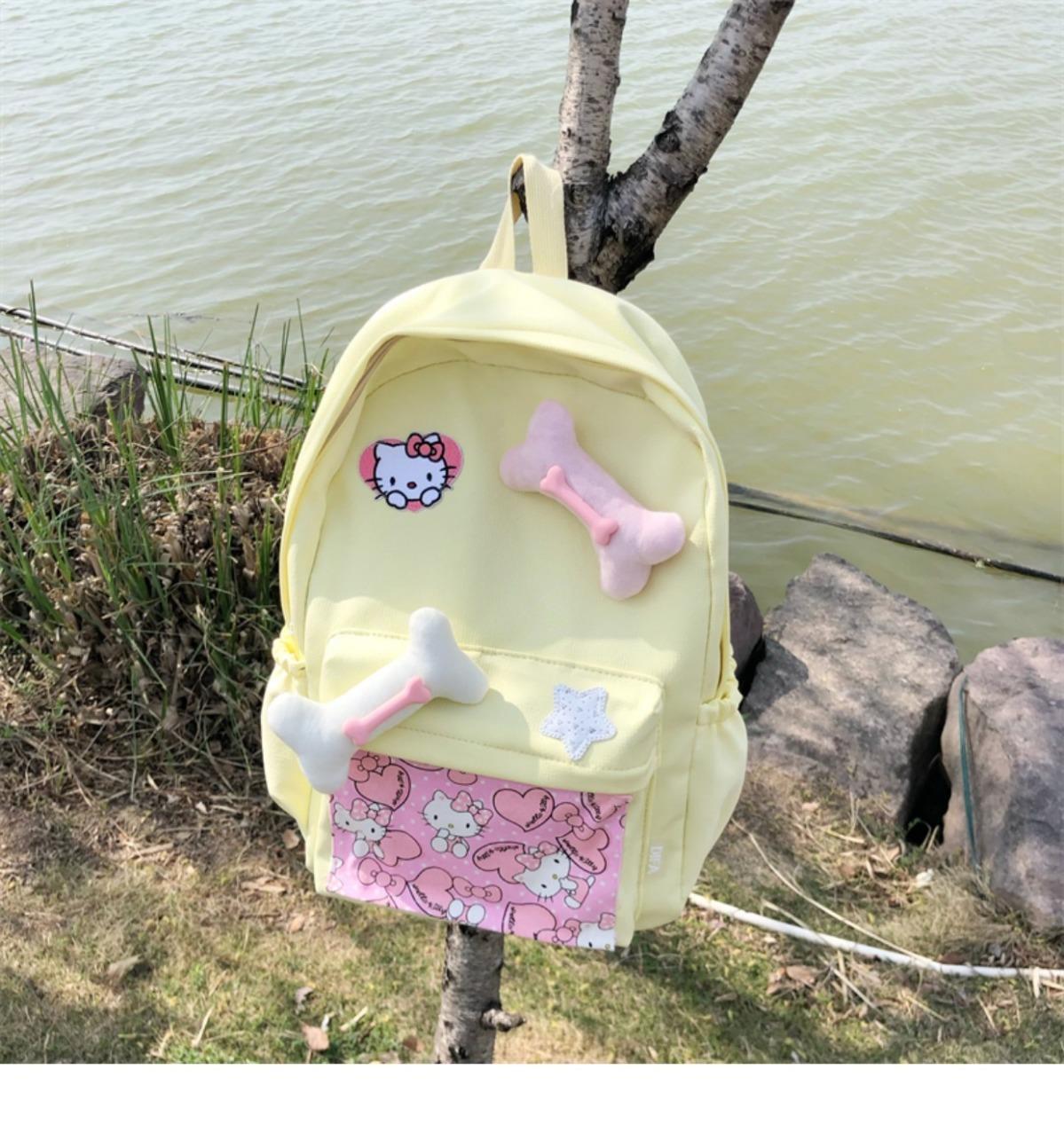 辣妹设计感背包可爱卡通猫猫骨头大容量清新黄色书包大学生双肩包详情8