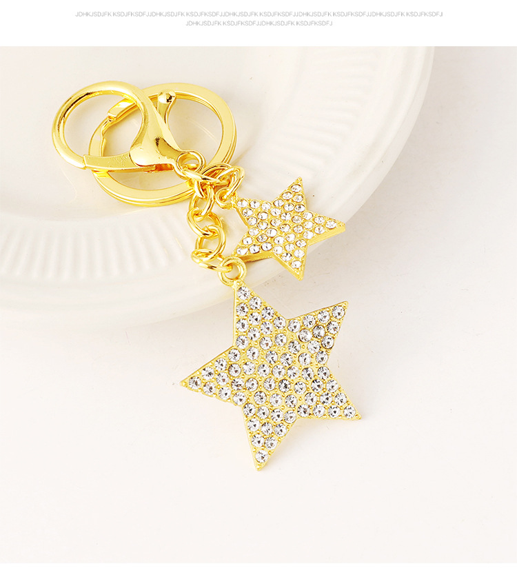 Wholesale of cross-border fashion diamond-encruted five-pointed star bags, keychains, metal star pendants and small gifts pic 7