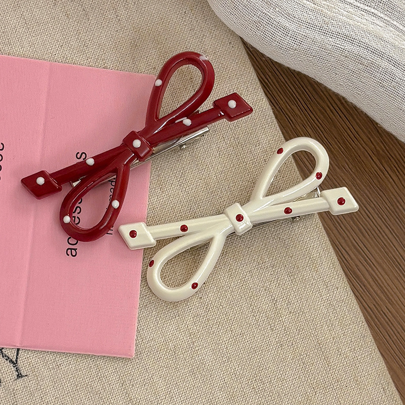 甜美波点蝴蝶结椭圆发夹女前额侧边刘海夹碎发鸭嘴夹儿童发卡头饰详情9