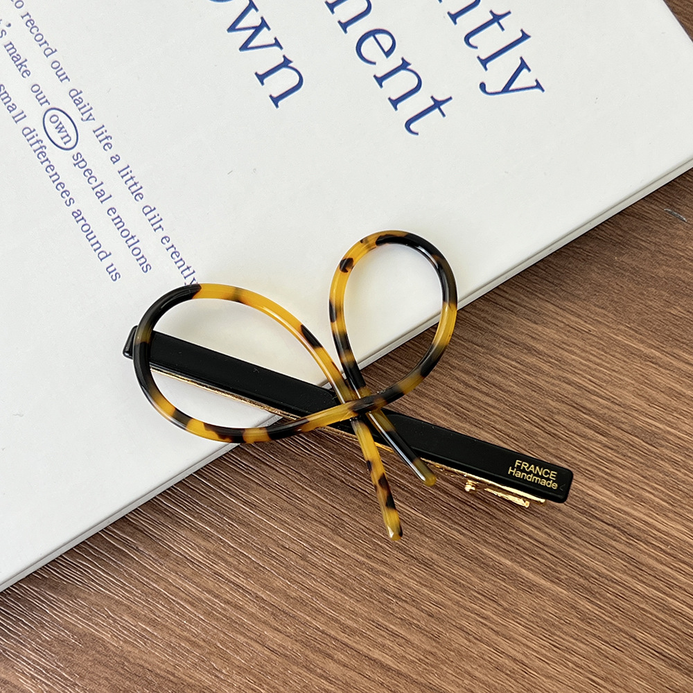 简约ins风交叉蝴蝶结夹子醋酸材质刘海夹高级感侧边碎发一字夹详情5