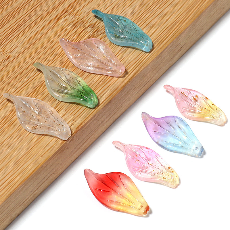 Wholesale of popular transparent colored gold sand leaf pendants in Europe and America, diy maple leaf bags, pendants and small accessories pic 20