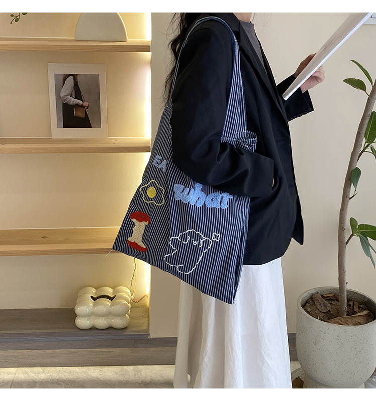 韩版时尚条纹帆布包包女2024新款大容量通勤托特包小众休闲布包详情12