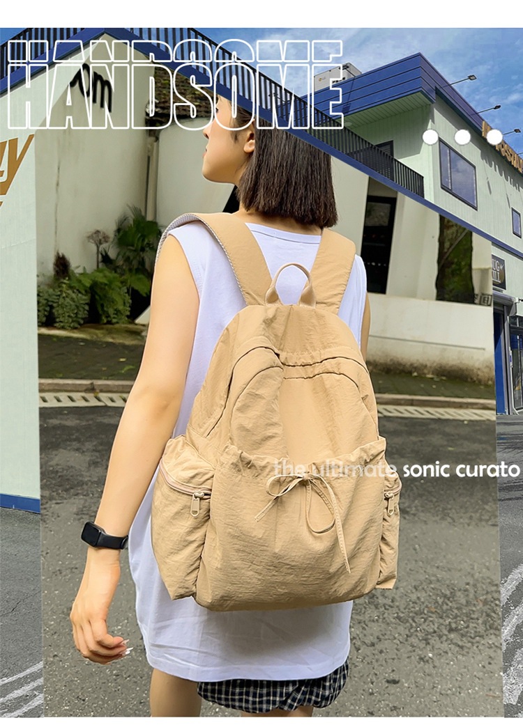 新款时尚轻便简约双肩包女日系文艺学生书包休闲运动旅行纯色背包详情1