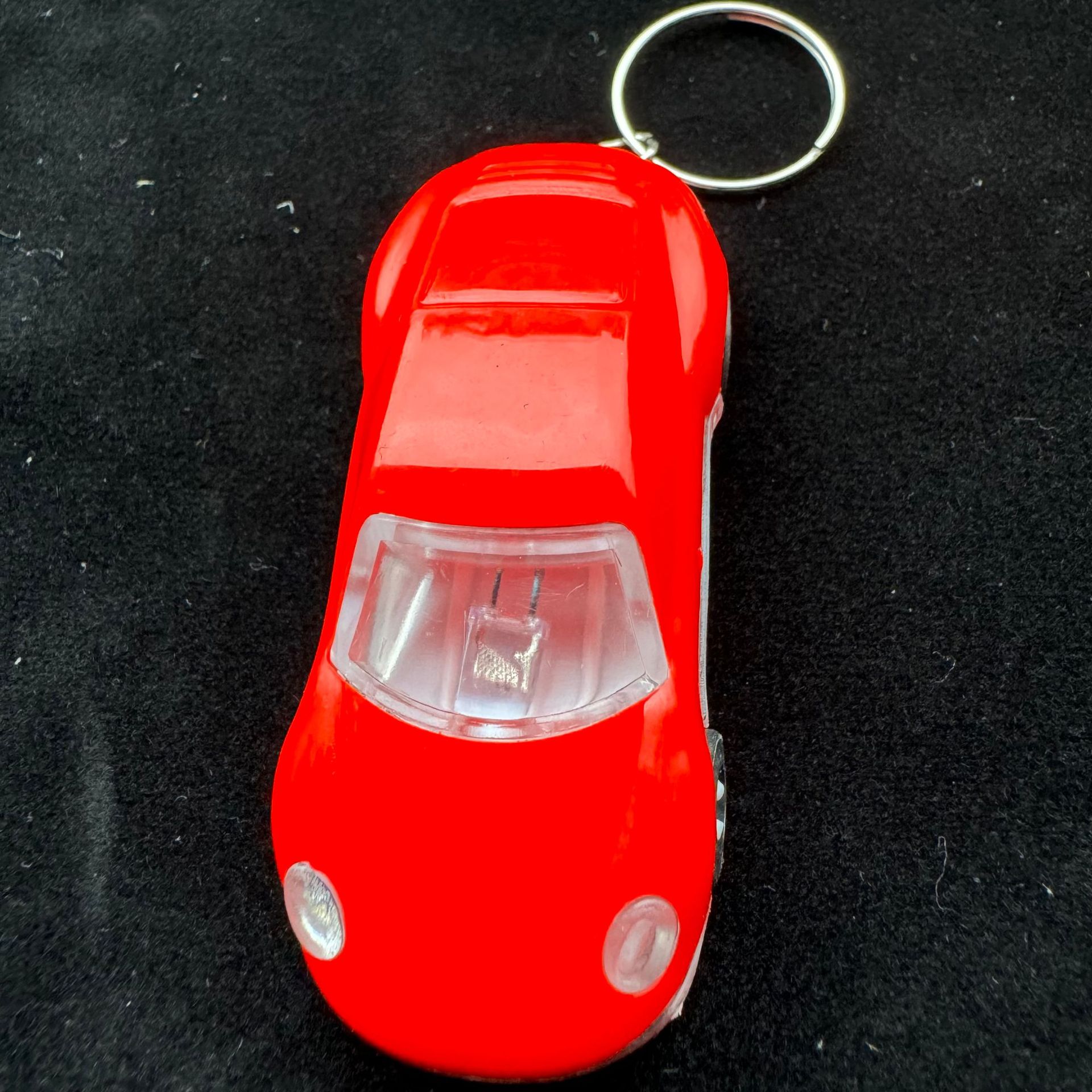 Wholesale of luminous toy car keychains, student bag pendants, fashionable car key pendants, sports car small gifts pic 4