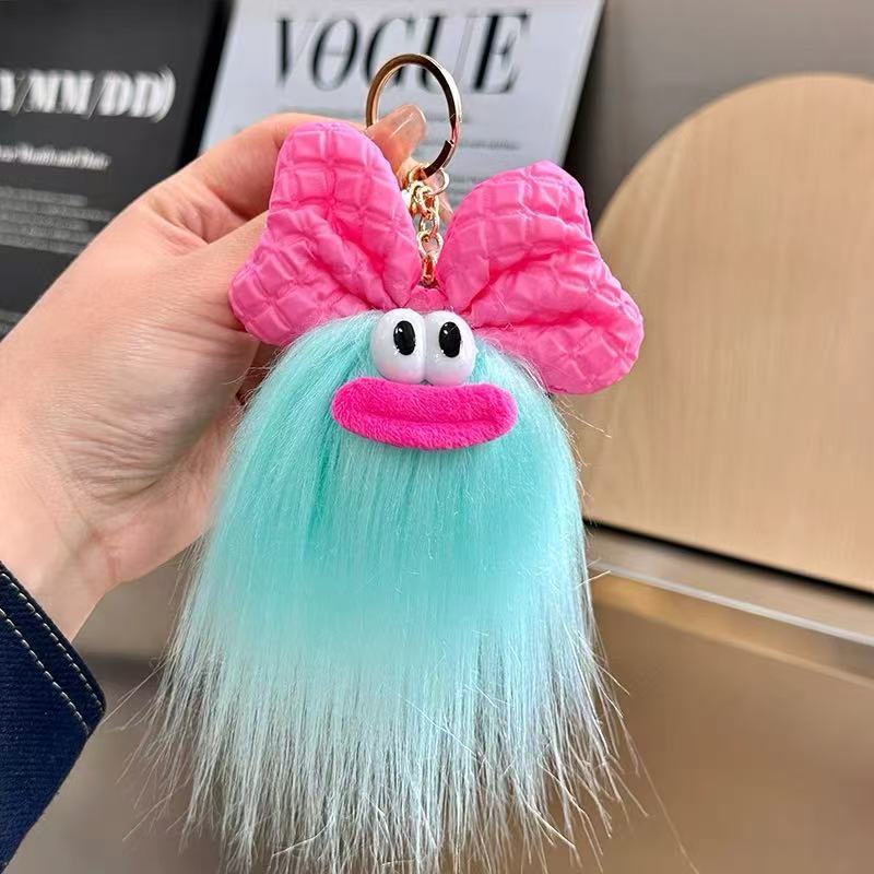 可爱蝴蝶结怪兽娃娃钥匙扣卡通搞怪毛绒书包挂件丑萌玩偶挂饰礼品详情10