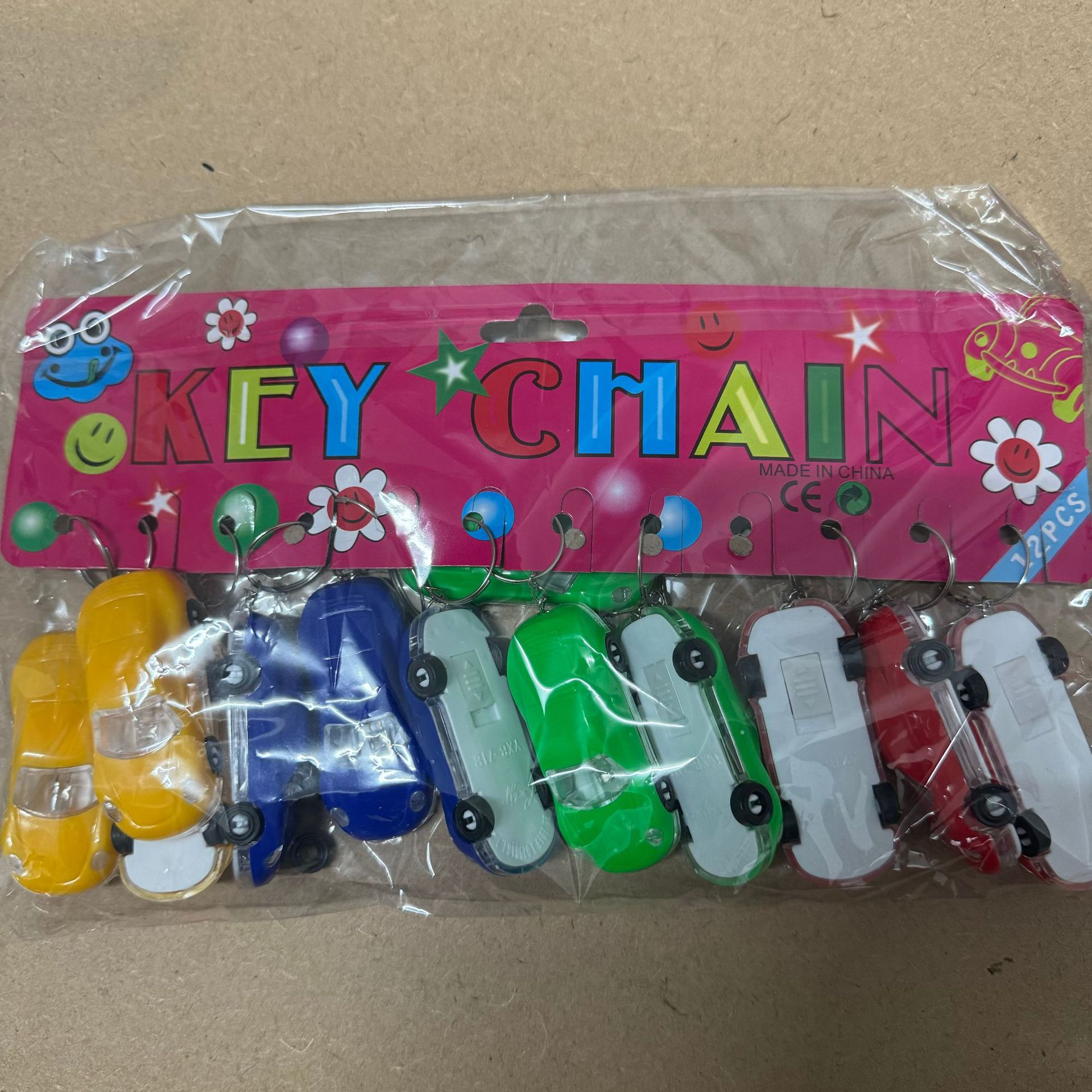 Wholesale of luminous toy car keychains, student bag pendants, fashionable car key pendants, sports car small gifts pic 7