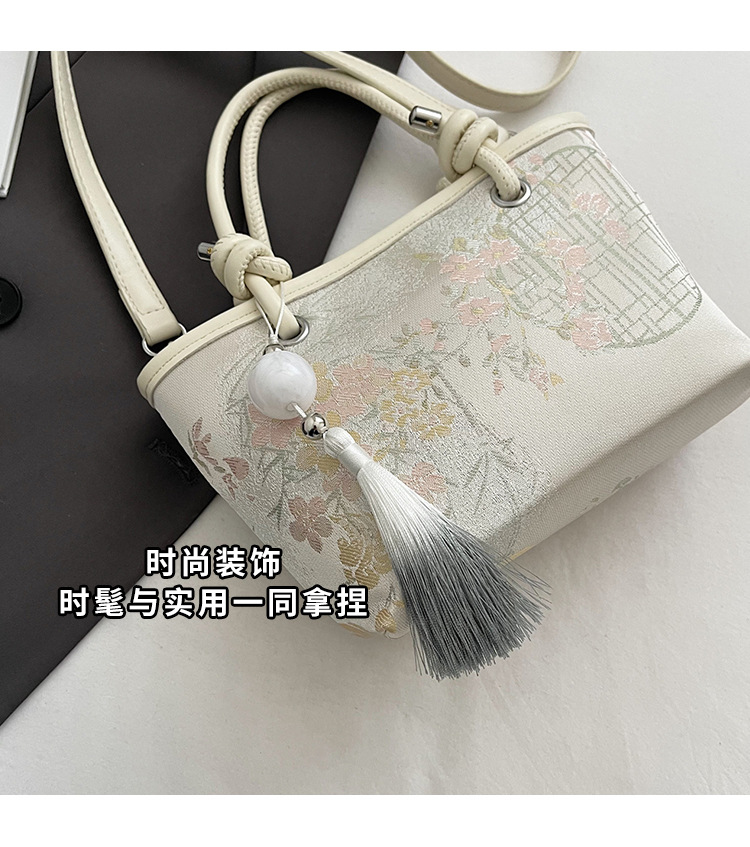 手拎新国潮式刺绣包包女2025春夏新款国风绣花时尚水桶包百搭斜挎包详情6