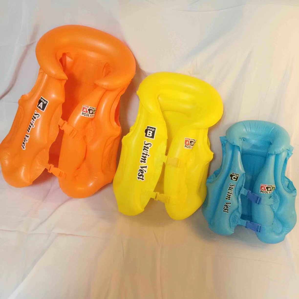 跨境专供充气儿童荧光色泳衣ABC浮力背心游泳装备外贸儿童救生衣详情2