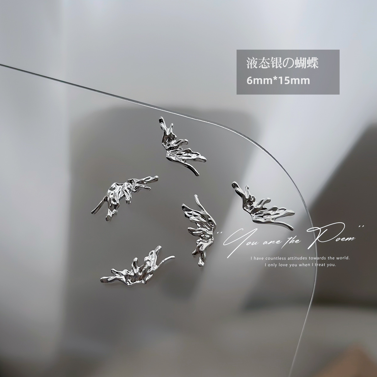Wholesale of y2k liquid silver alloy butterfly wing hollowed-out mini bow tie nail accessories pic 14