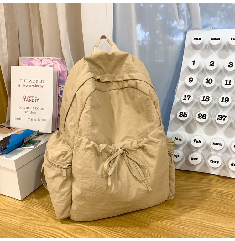 新款时尚轻便简约双肩包女日系文艺学生书包休闲运动旅行纯色背包详情43