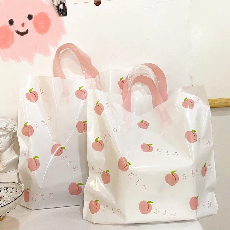 服装店袋子手提塑料袋夏日水蜜桃清新诱惑塑料购物袋化妆品袋包邮详情4