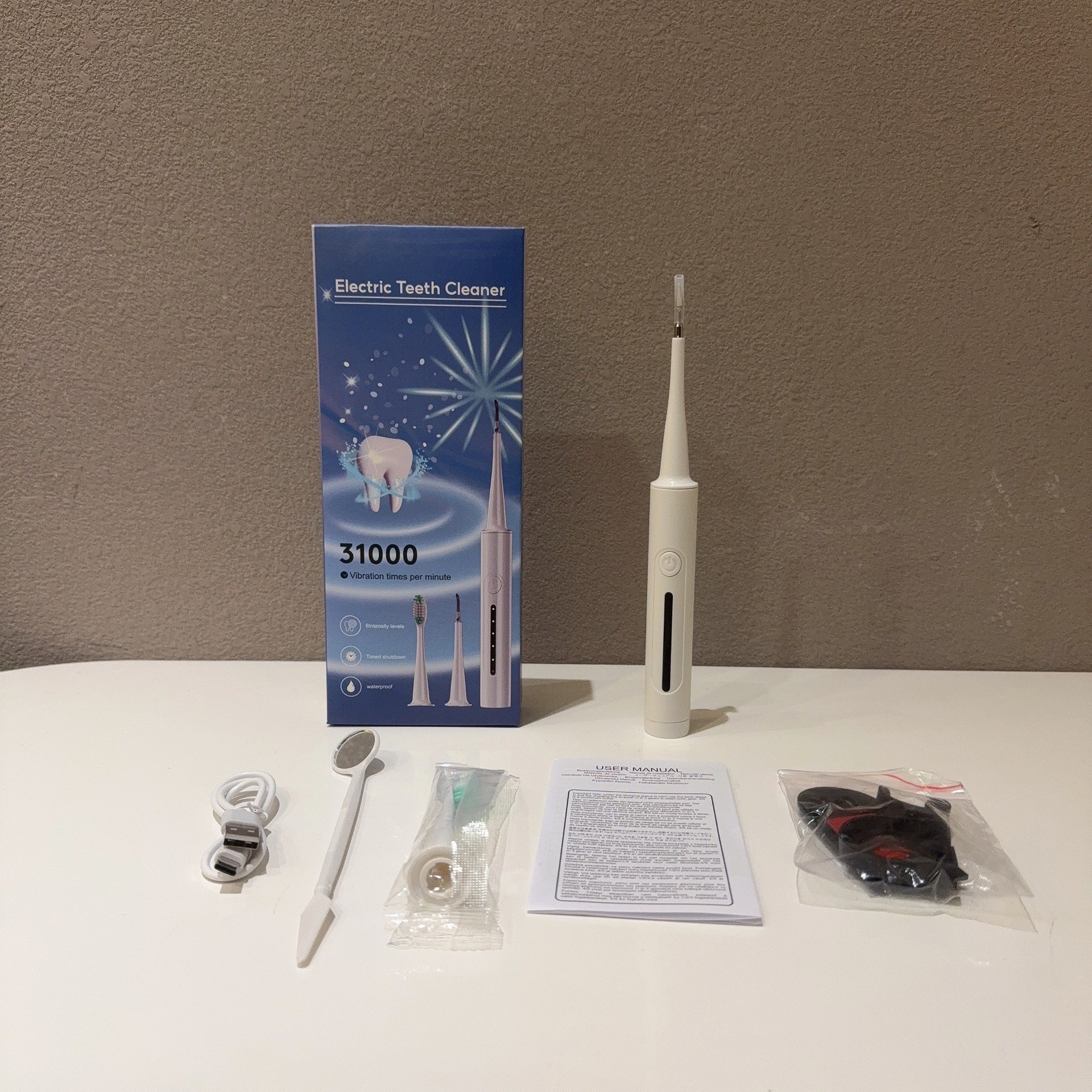 A popular foreign trade product, the six-in-one electric toothbrush set, portable tartar removal, teeth cleaning and beauty device pic 15