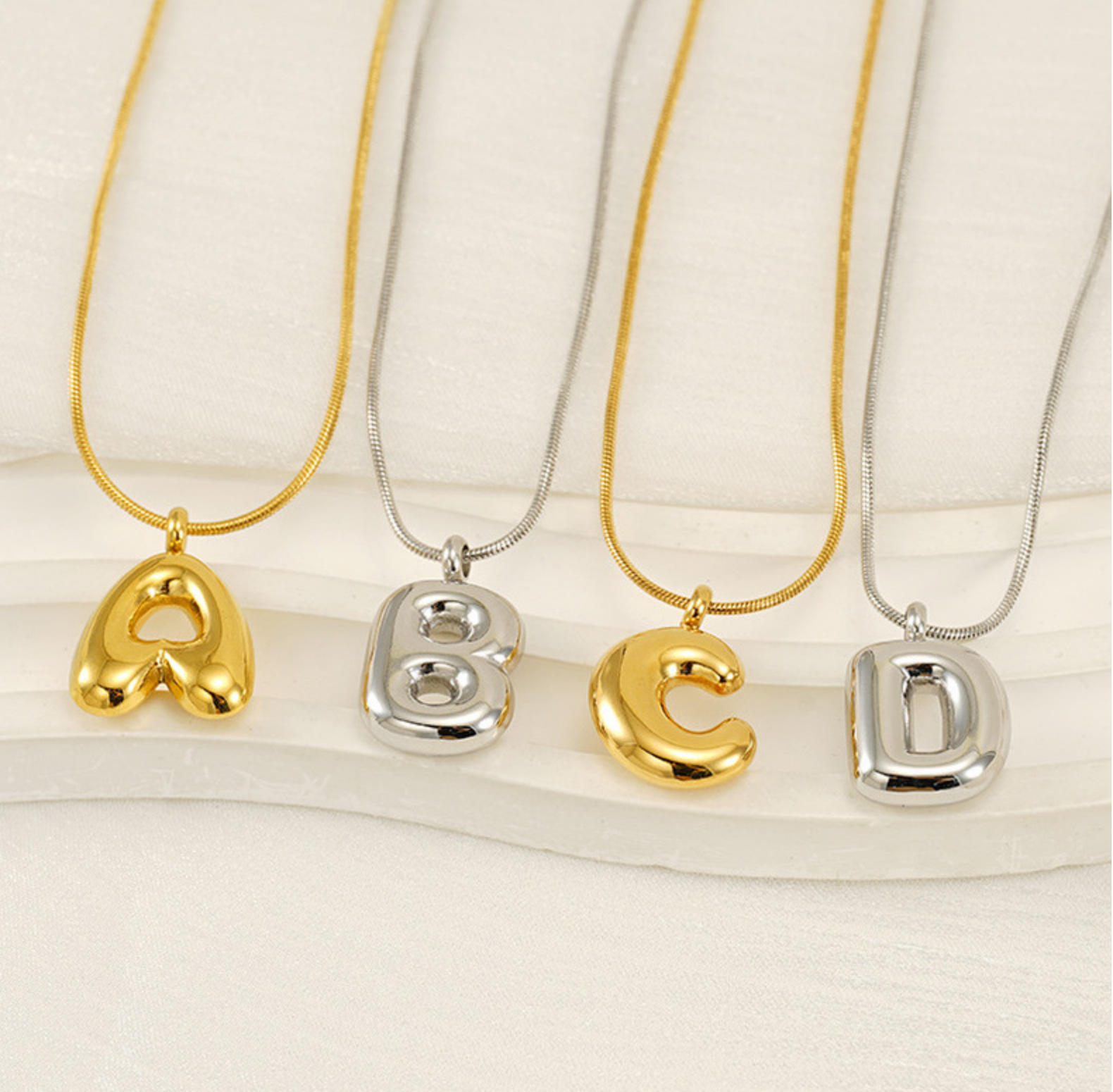 Cross-border best-selling bubble 26-letter smooth pendant necklace, a niche and versatile gold-plated titanium steel necklace accessory pic 21