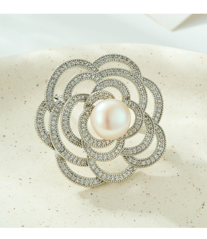 A light luxury and elegant camellia brooch with a high-end feel. It features a copper alloy freshwater pearl inlaid with zircon and a three-dimensional hollowed-out brooch pic 12