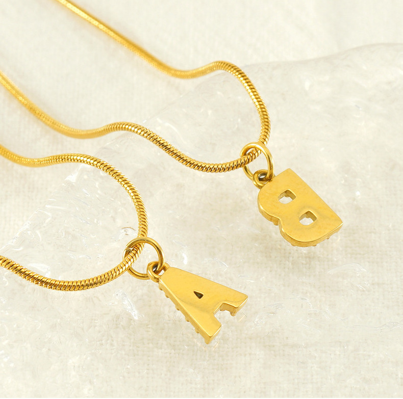 Cross-border European and American stainless steel fashion 26 English diamond-encrusted small letter necklace, simple and versatile titanium steel snake chain necklace for women pic 21