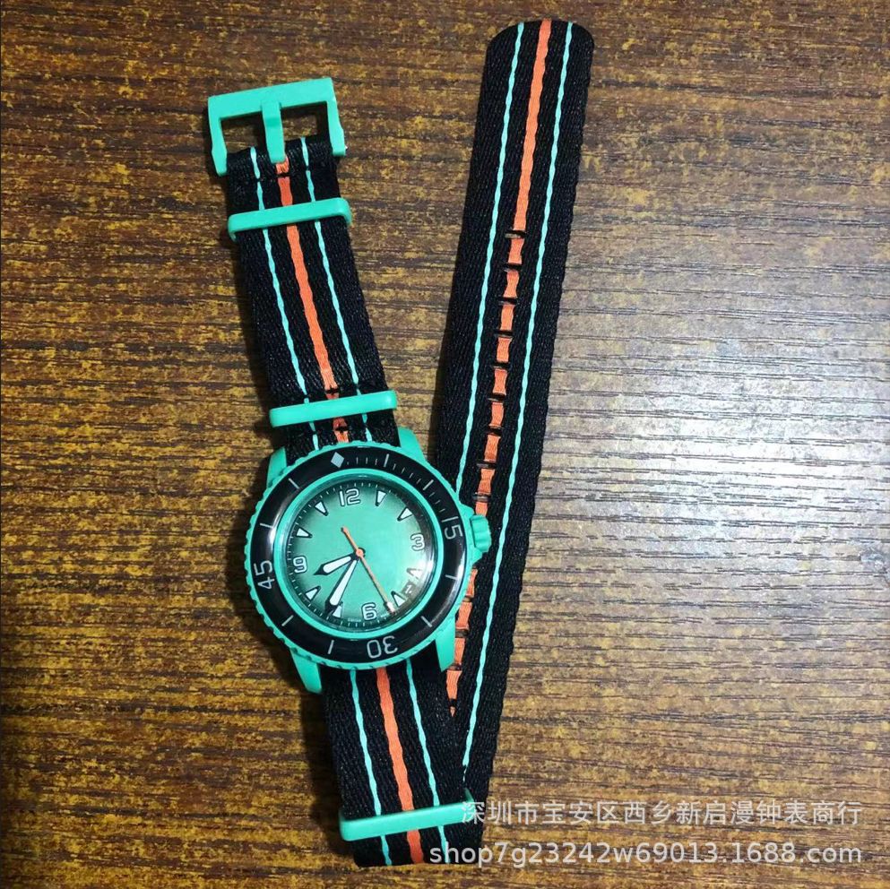 跨境爆款男女情侣五大洋石英联名款外贸热销海洋系列透底转盘手表详情8