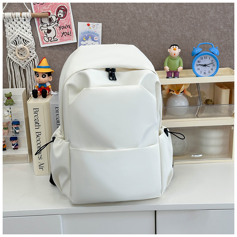 New large-capacity solid color backpacks for girls in foreign trade, simple and elegant school bags for junior and senior high school students pic 10