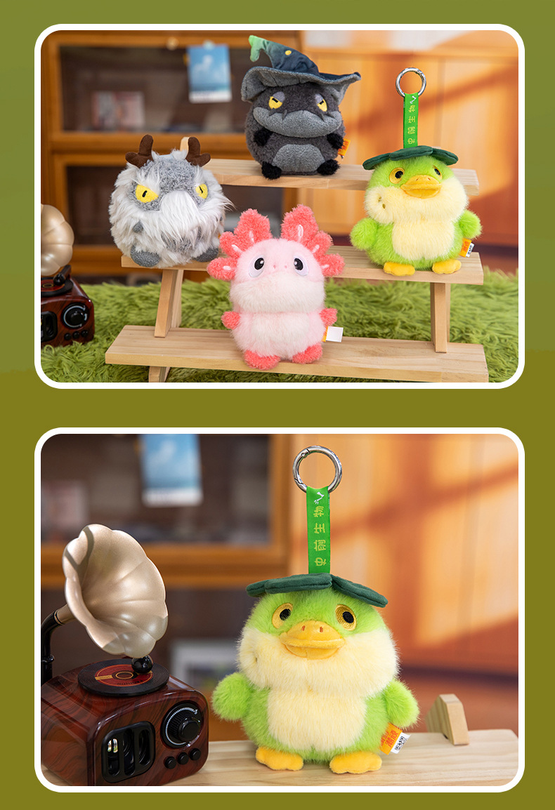 A grey totoro wearing a wizard hat and a red horned dragon plush toy AI star Man AI toy pic 20