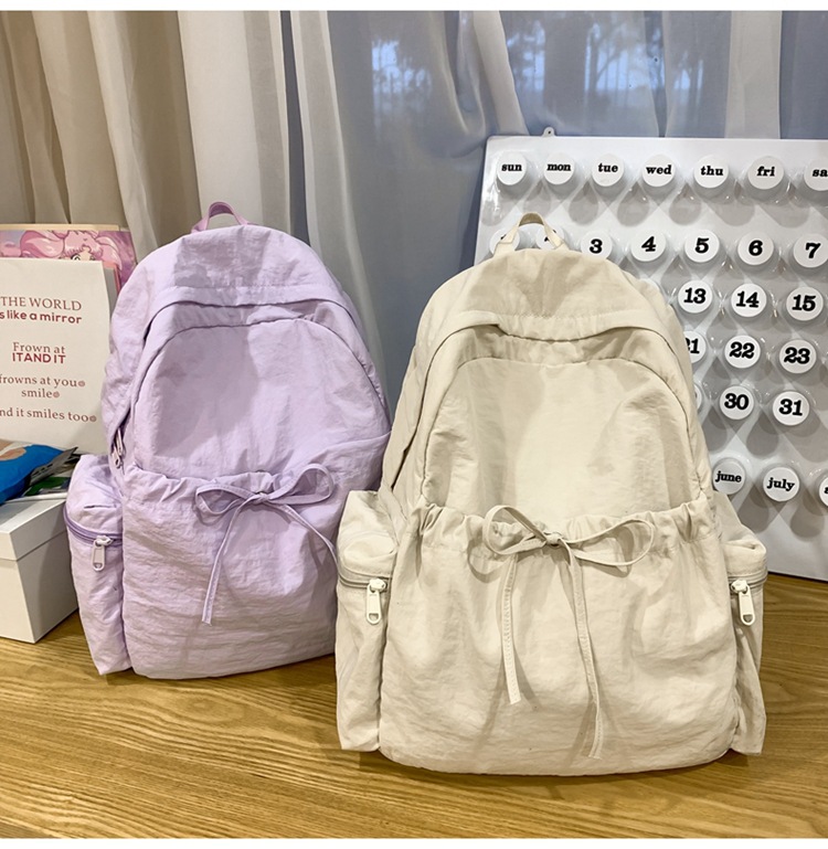 新款时尚轻便简约双肩包女日系文艺学生书包休闲运动旅行纯色背包详情34