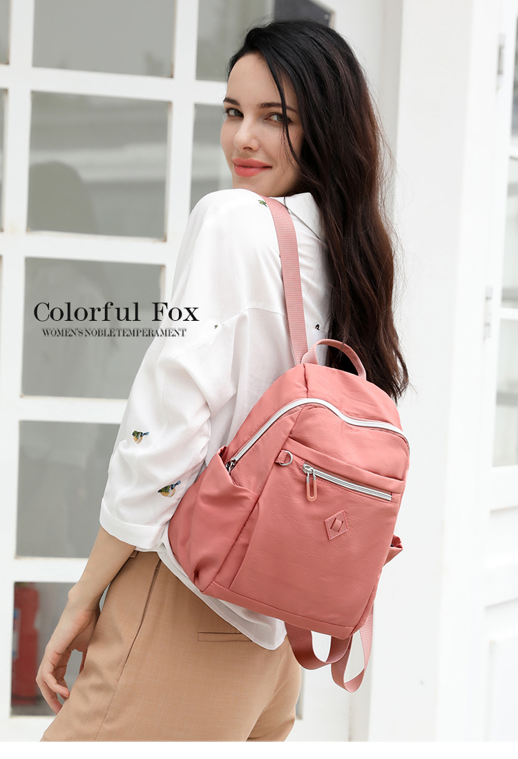 大容量双肩包女士时尚潮流韩版背包防泼水出行旅行包情侣韩版书包详情5