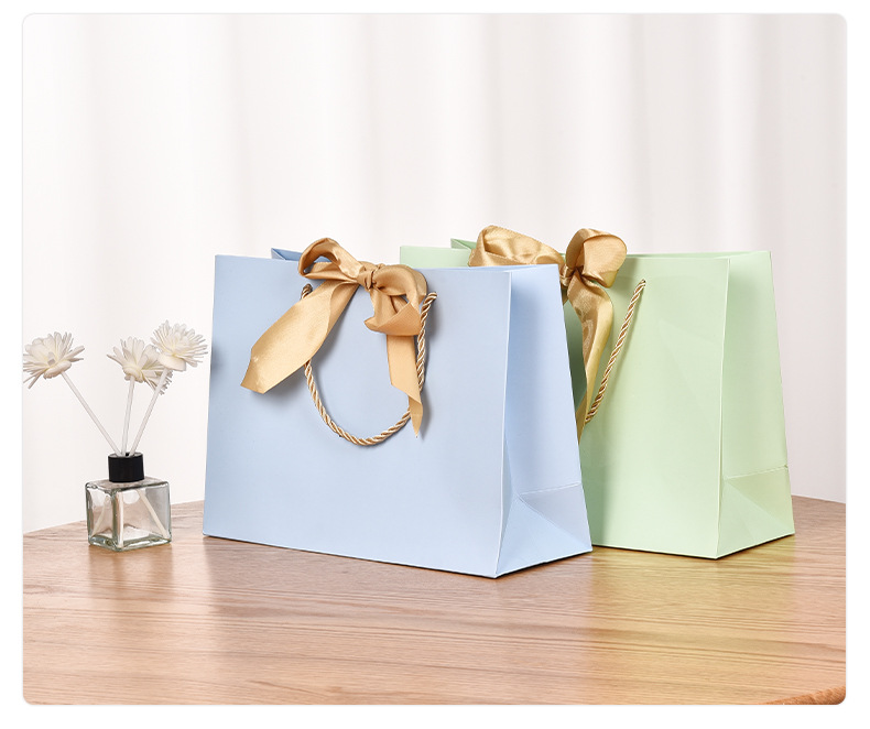 Wholesale of clothing handbags, paper bags, bow gift bags, shopping bags, solid-color packaging bags, logo printable gift bags, paper bags pic 21
