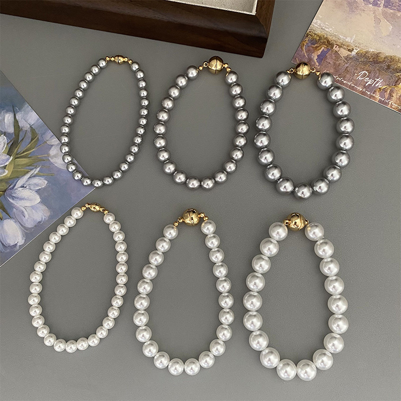 This is a trendy accessory for women, featuring a strong Australian white round magnetic pearl bracelet. It exudes a light luxury, niche and high-end vibe pic 4
