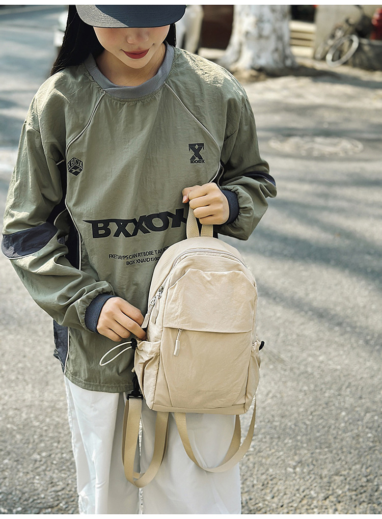 新款多功能防泼水双肩胸包男女轻便出游小背包男士户外登山斜挎包详情17