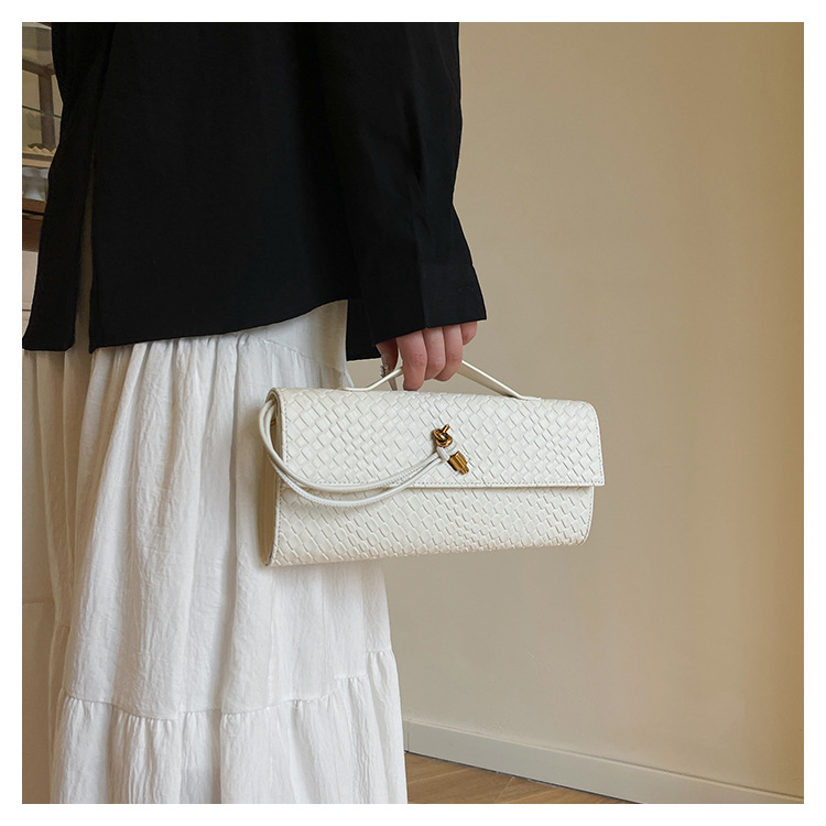 A new cross-border woven pattern single-shoulder crossbody bag with a retro texture, a hand-held baguette bag, and a versatile and elegant evening clutch pic 36