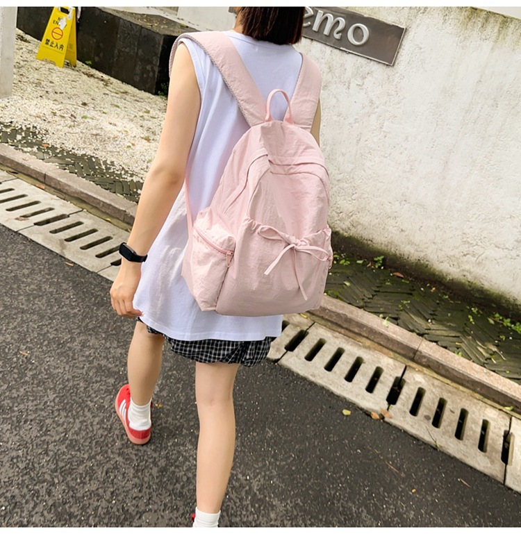 新款时尚轻便简约双肩包女日系文艺学生书包休闲运动旅行纯色背包详情15