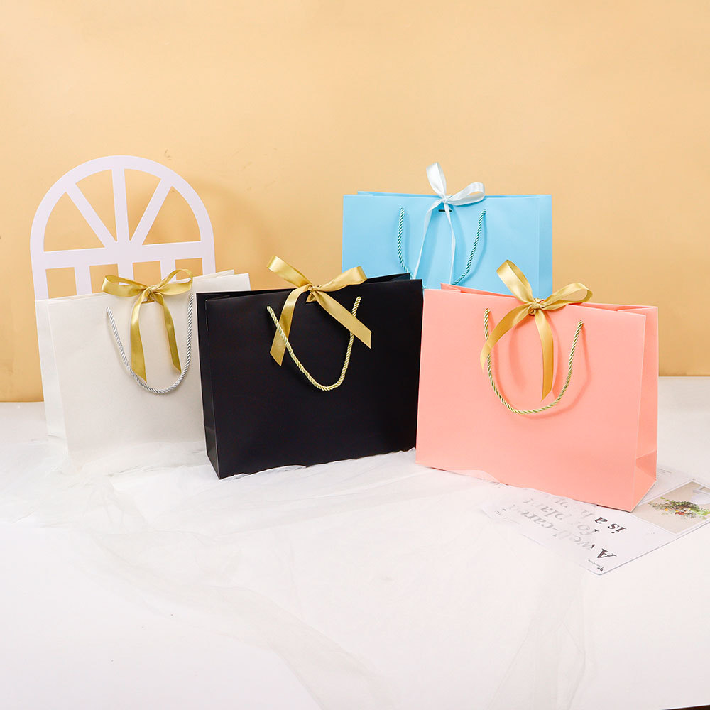 High-end handbags in stock, white packaging bags, gift bags, paper bags, high-end style, wedding hand-held bags, clothing store pic 3