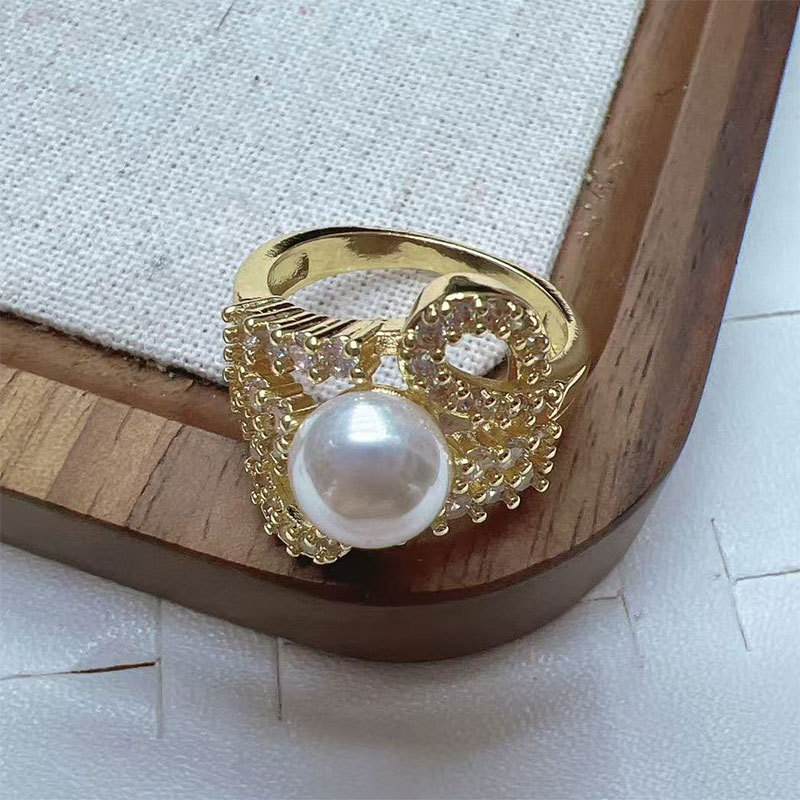 Korean high-end pearl ring, light luxury and niche design, geometric diamond-encrusted round bead, cold style open ring for women pic 3