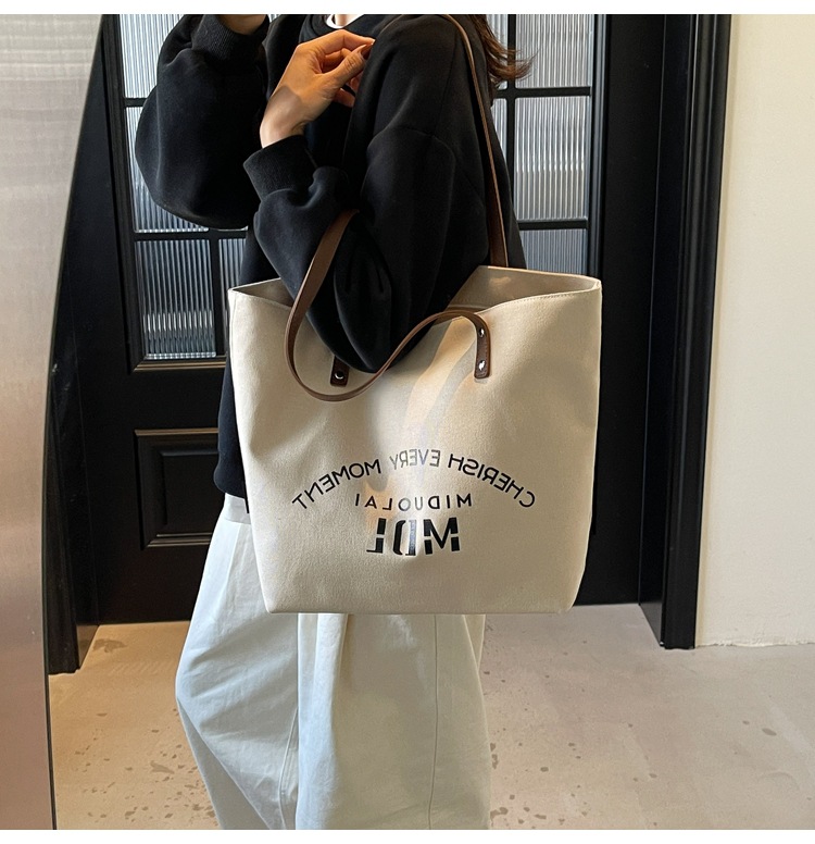 Large-capacity 2025 new style simple single-shoulder hand-carry cloth bag, college student class tote bag, versatile canvas bag for women pic 11