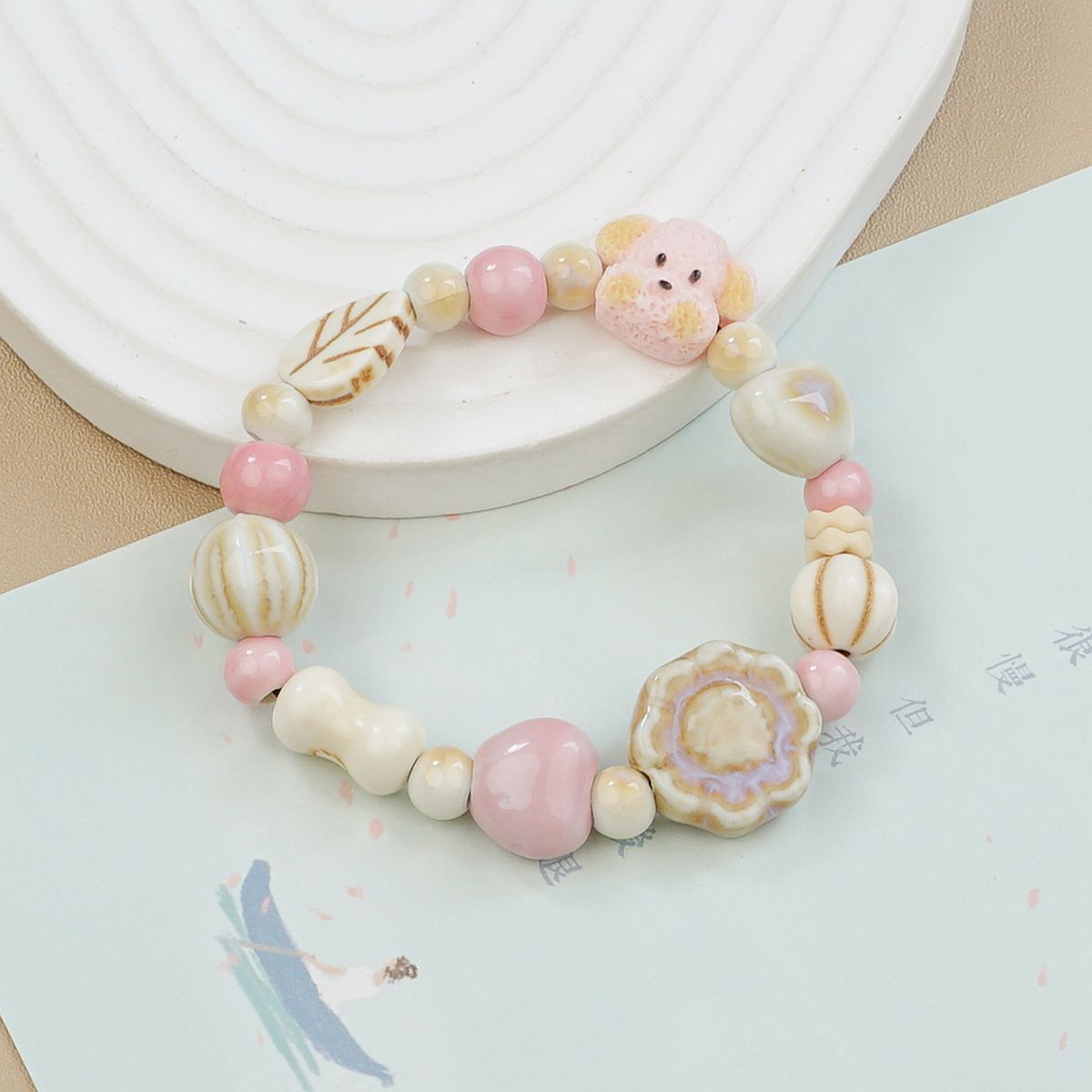 Jingdezhen ceramic bracelets, cartoon with texture, Teddy dog handcrafted ornaments, bracelets, student gifts, and street vending accessories pic 3